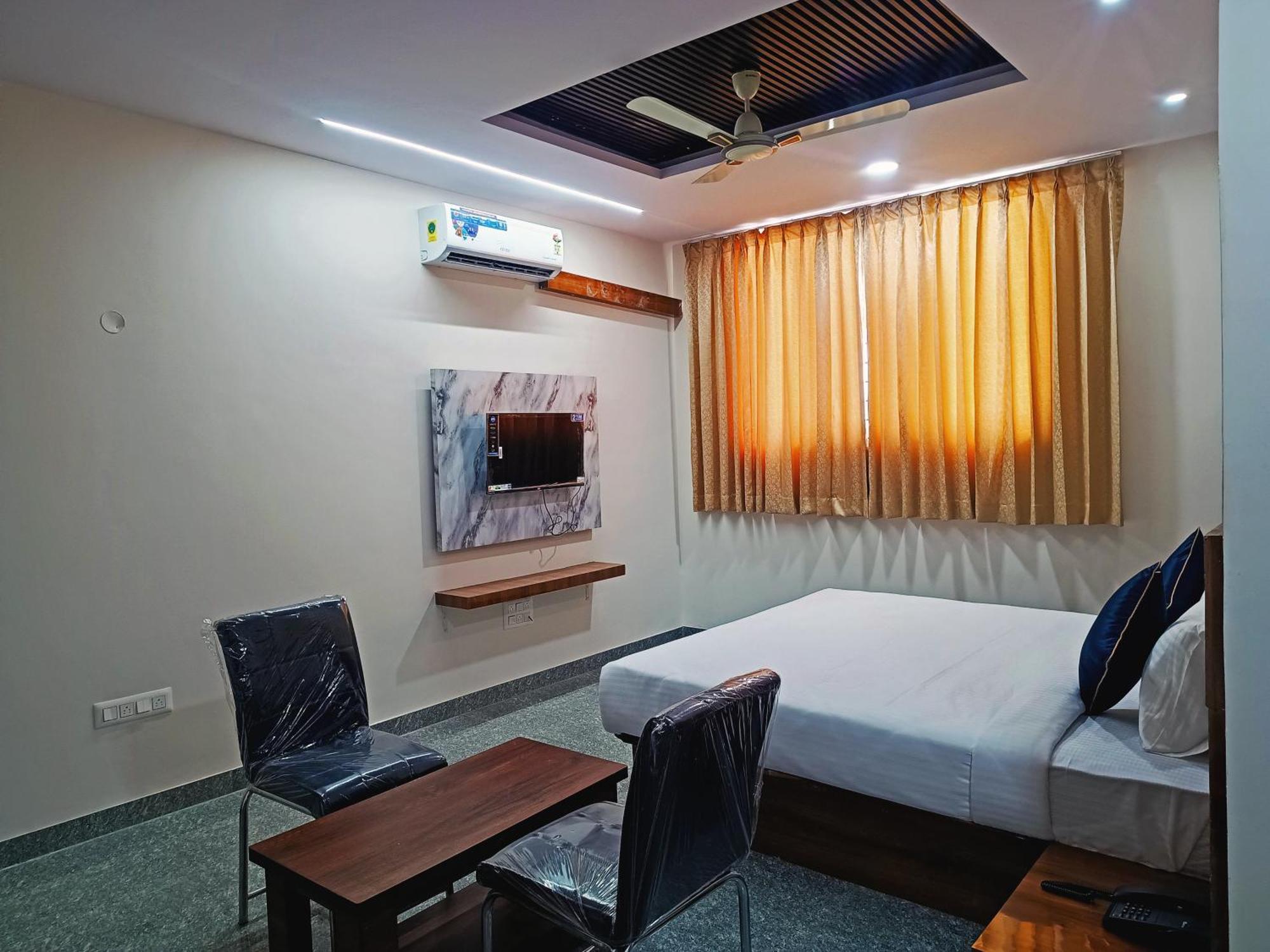 העיר בנגלור Hotel Achhu Palace מראה חיצוני תמונה